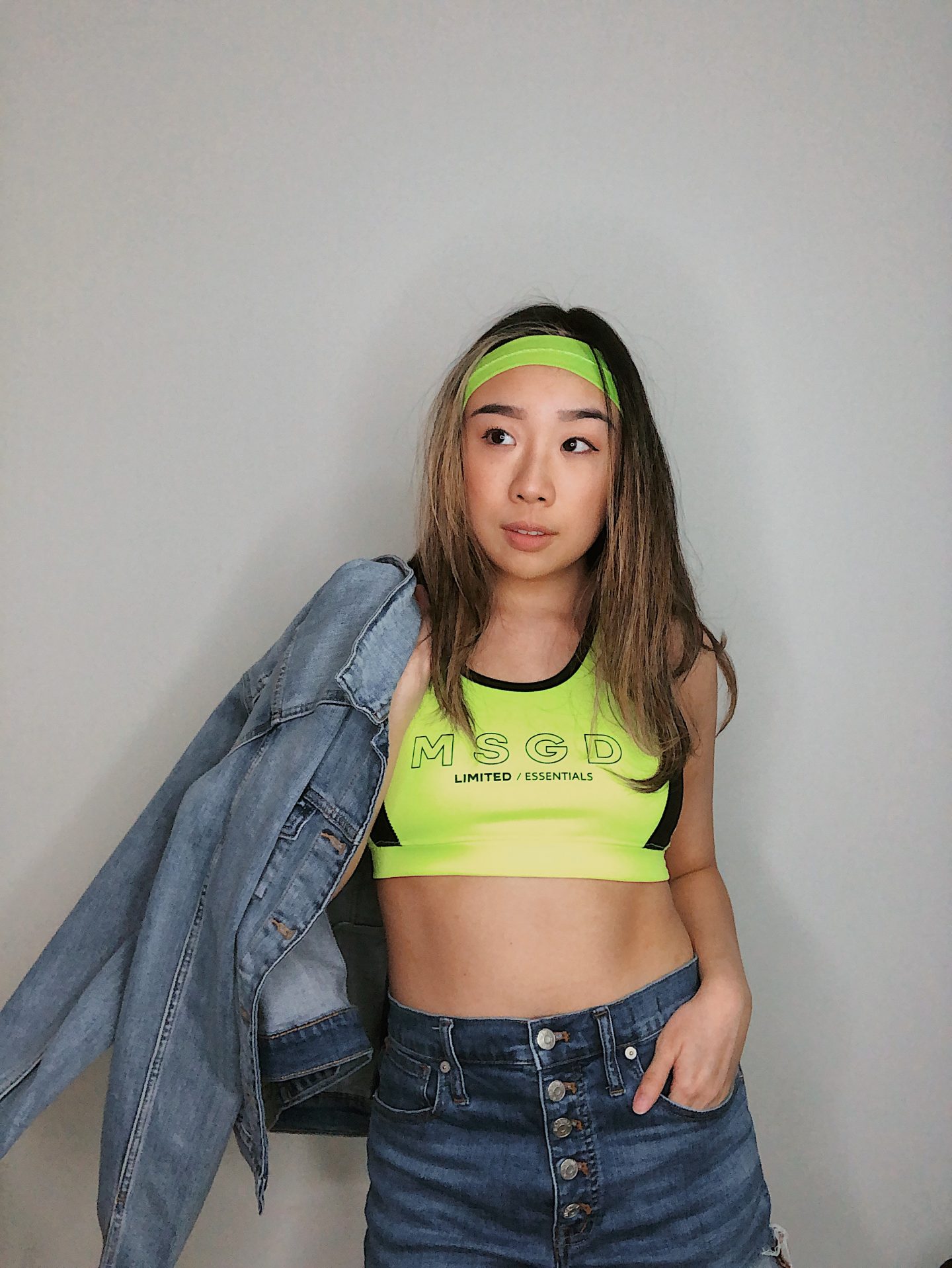 jean jackets on top of jean shorts with pops of neon 