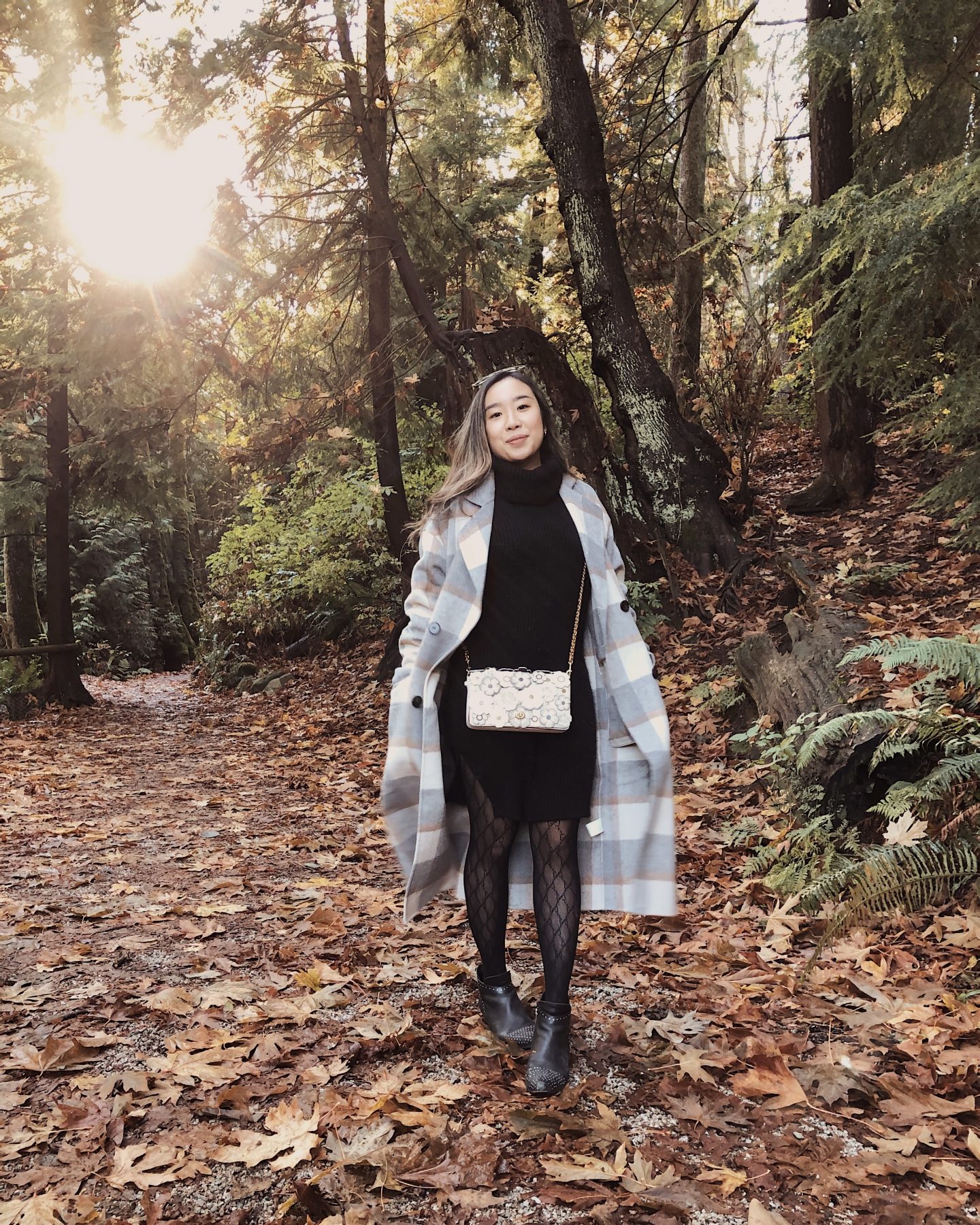 Strolling through the fall leaves with my fall plaid coat in the sun