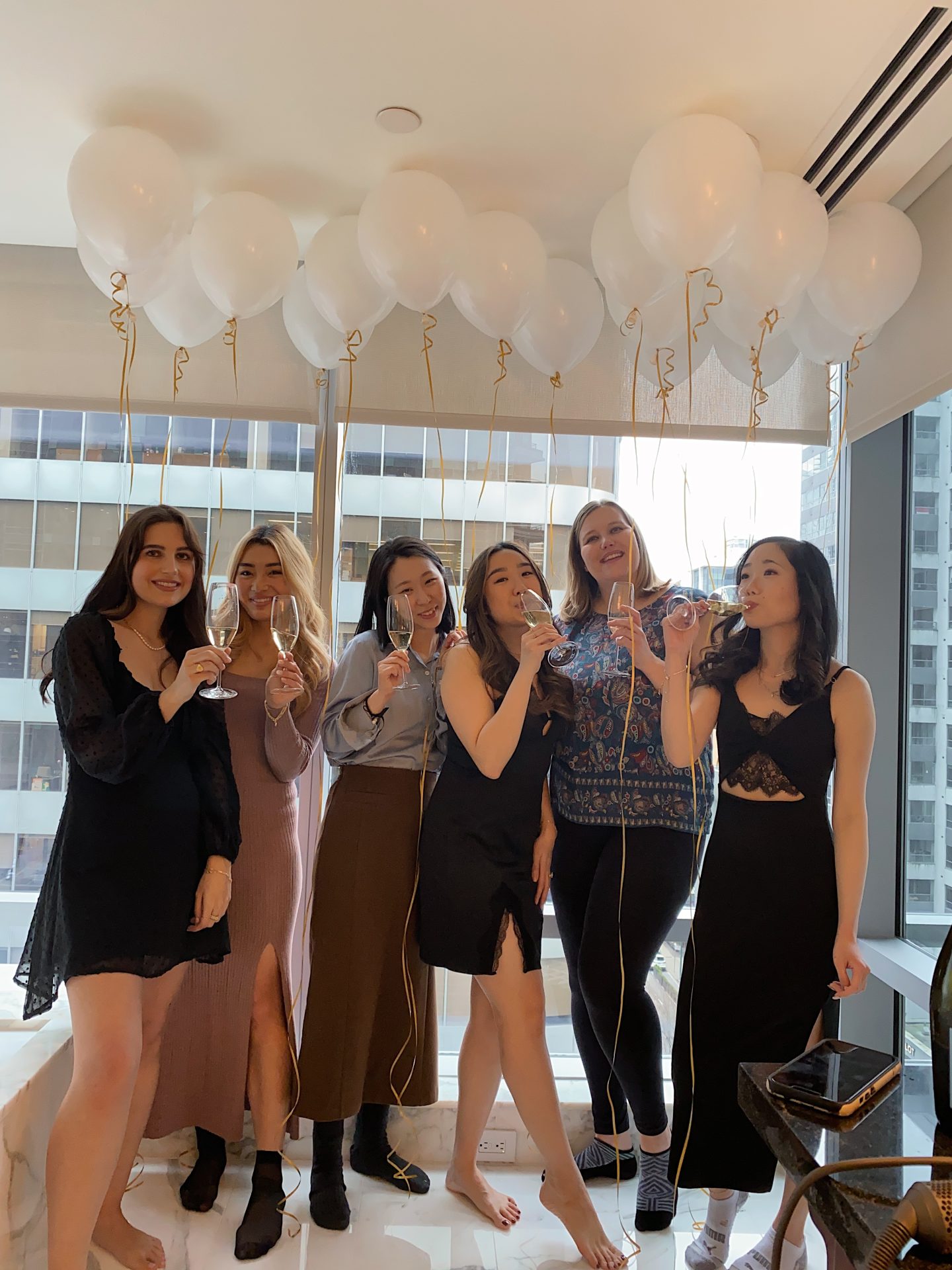 my 5 bridesmaids and I saying cheers to a good night