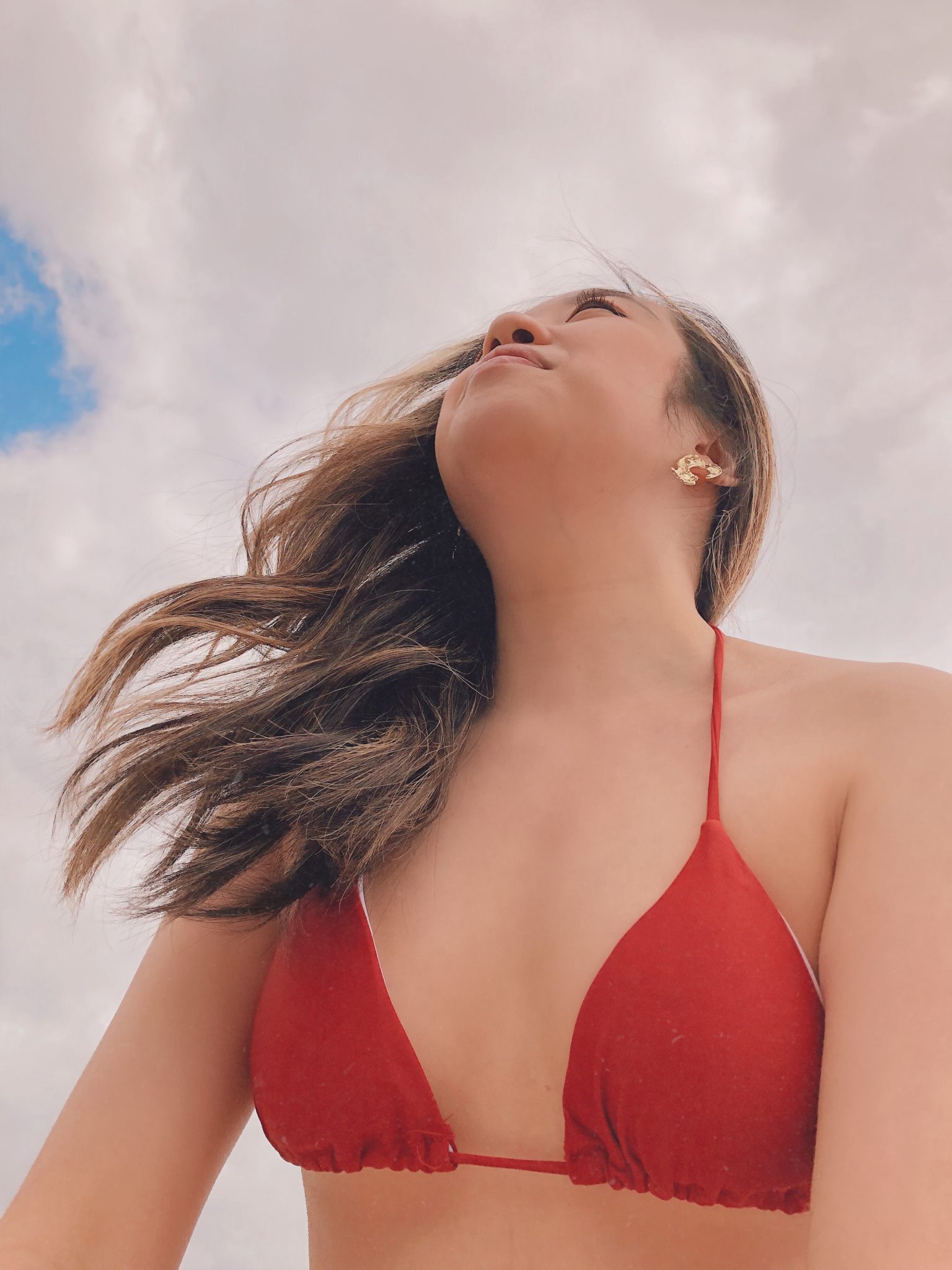 Wearing my classic red bikini on a sunny day