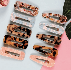 holiday gift guide in various marble patterned clips