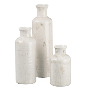 white vases in multiple heights and sizes
